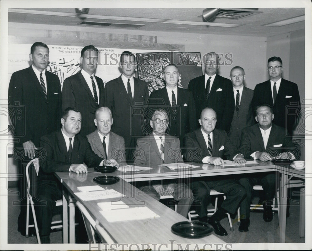 Press Photo Officers and Director of Downtown Waterfront Corporation. - Historic Images