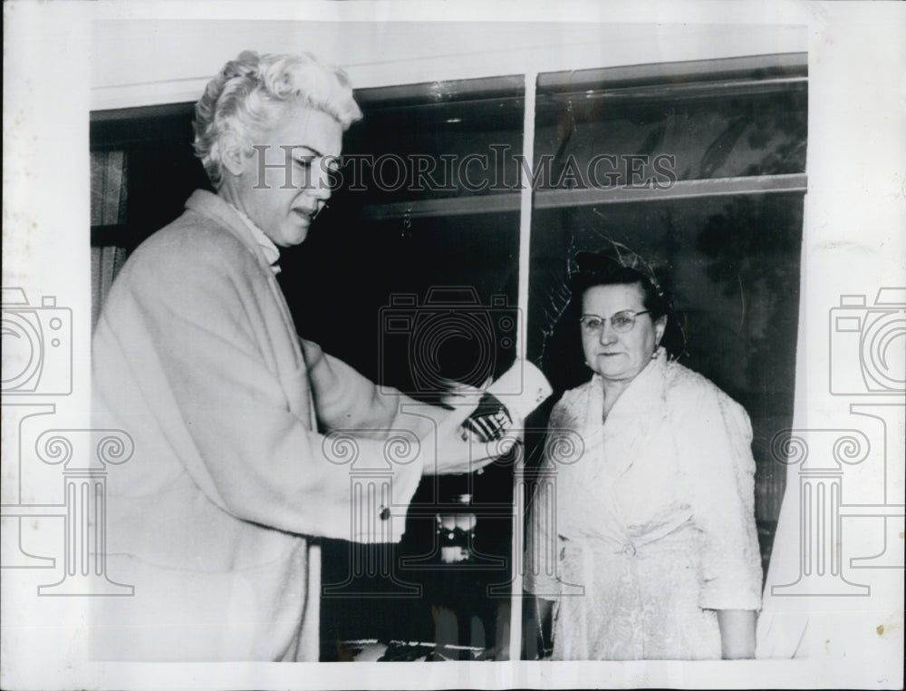 1954 Press Photo Teens damage the window of Pianist Mrs. Walter Liberance Home. - Historic Images