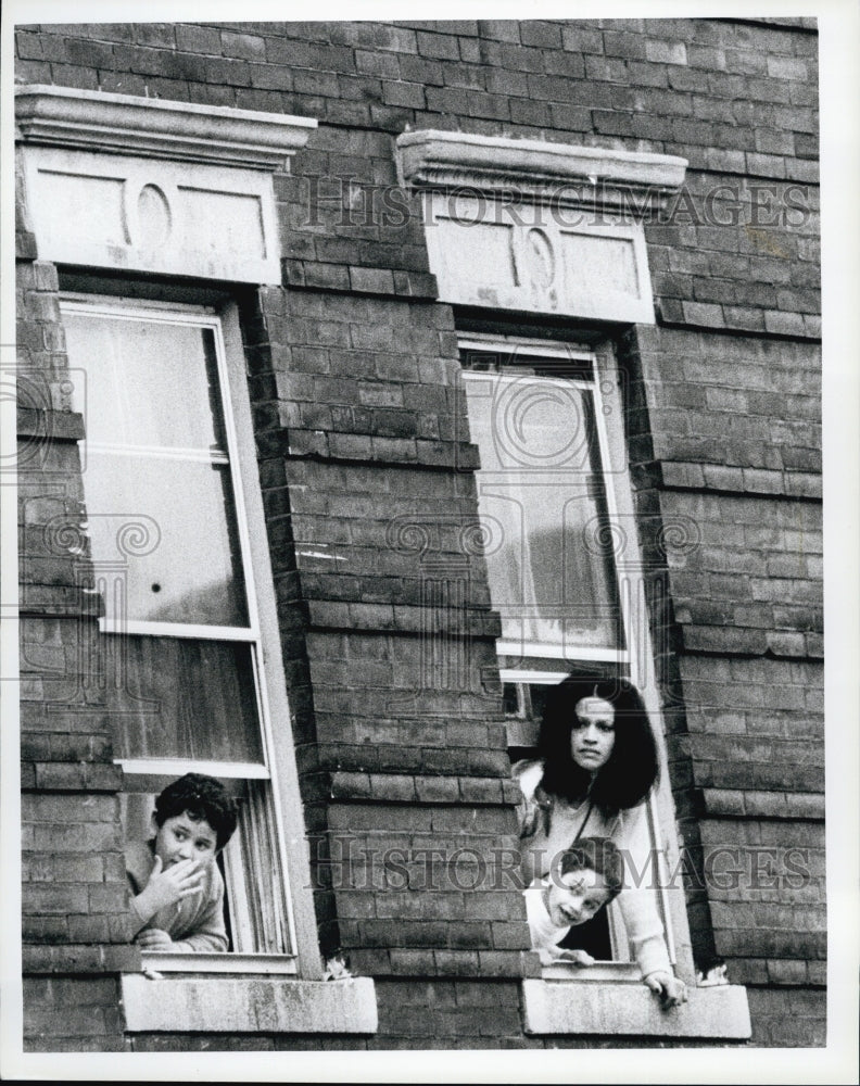 1982 residents peck their heads watching Willian Arkingson Funeral.-Historic Images