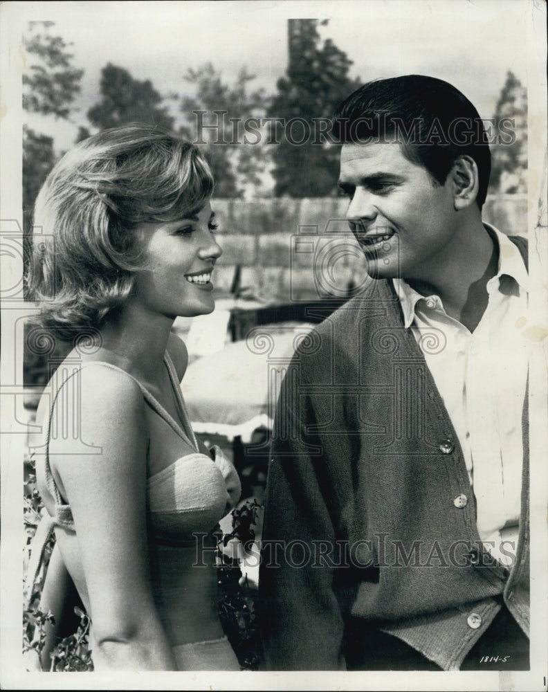 1963 Pamela Austin and John Baker in scene from &quot;No Kidding&quot;.-Historic Images