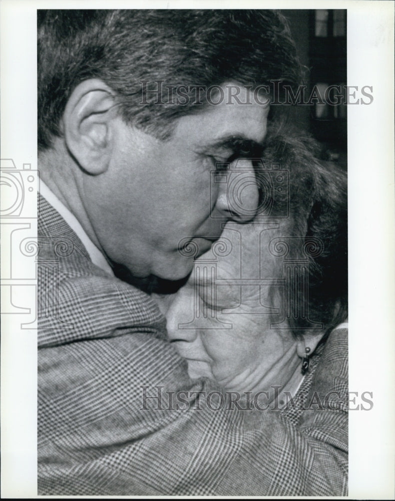 1990 Governor Mike Dukakis embraces Rosella Fitts, mother of war vet-Historic Images