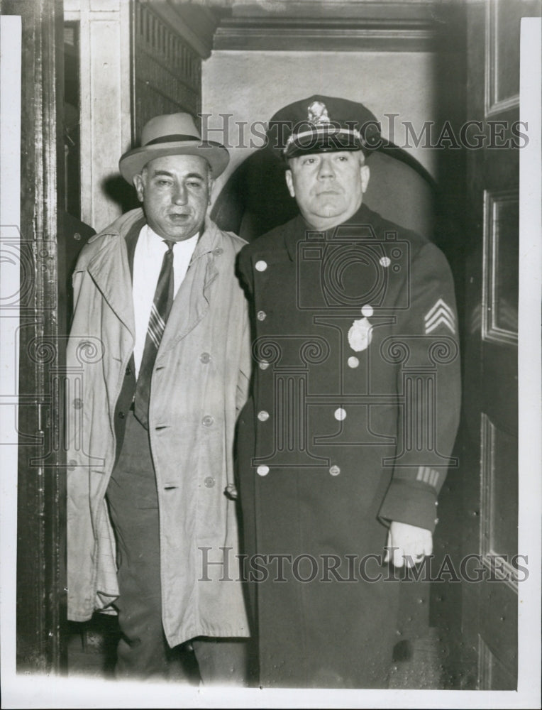1955 Ralph Synes held for murder charges w/ Sgt. John O'Donnell-Historic Images