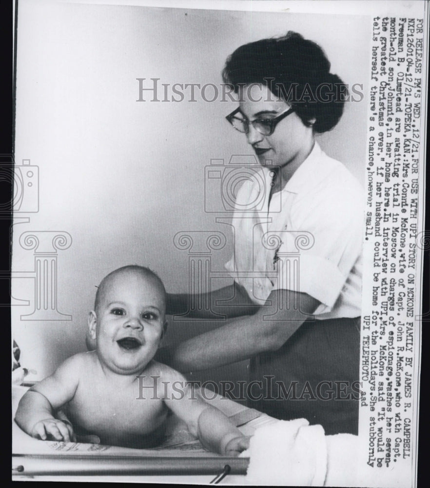 1960 Mrs.Capt John R.McKone, washed their seven months baby.-Historic Images