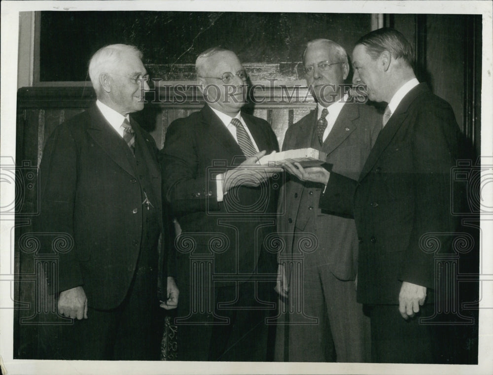 Ex-Mayor Malcolm Nichols holds a block of tickets of Coley theater.-Historic Images