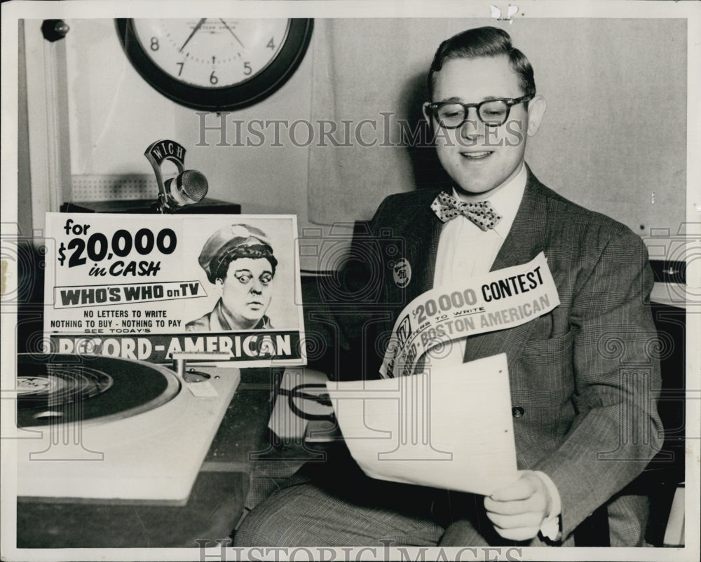 1955 Frank Sweeney,popular disc jockey at WICH, looks over a script.-Historic Images