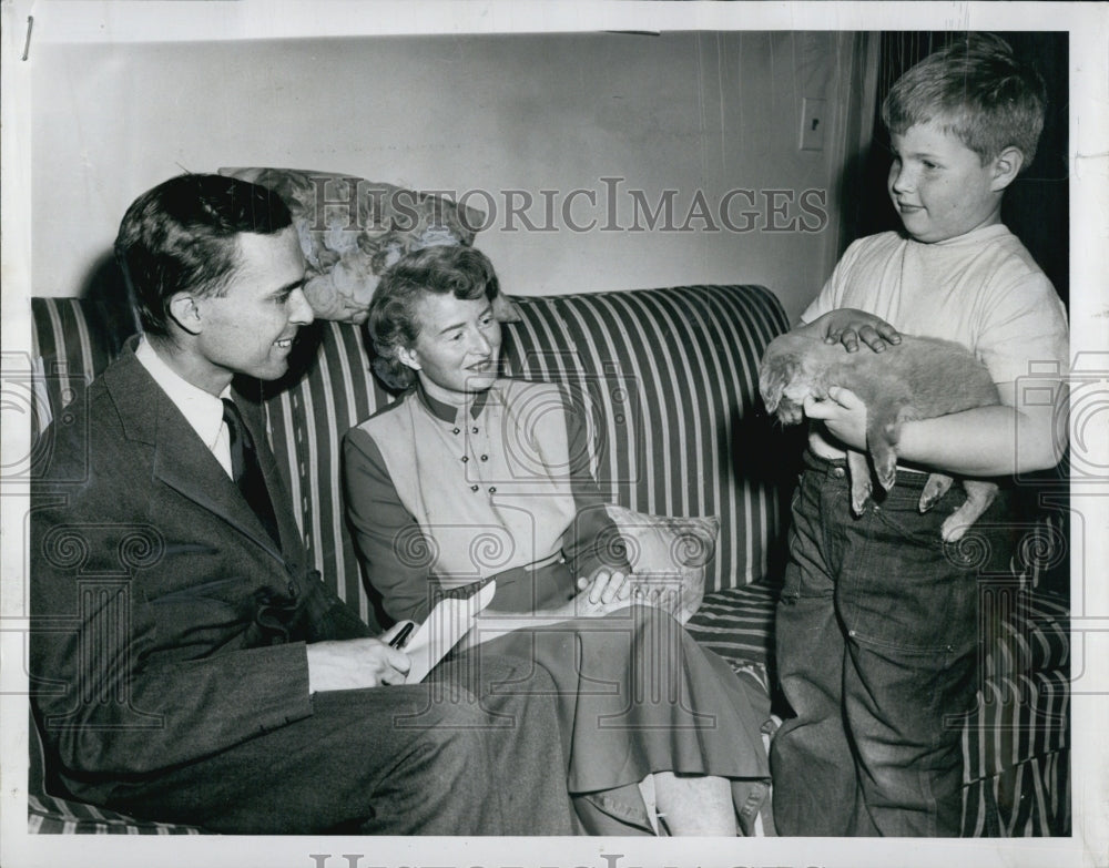 1951 Mrs. Dudley Merrill son shows his new puppt with Mr. Beal.-Historic Images