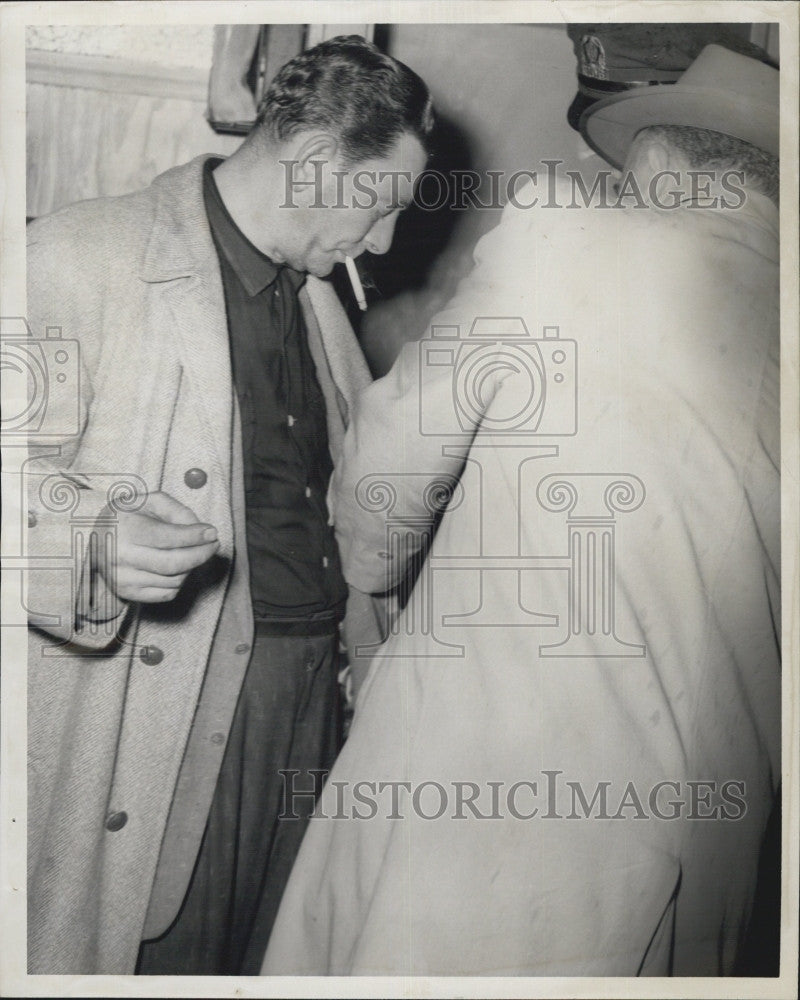 1956 Press Photo Ruby Needle is searched by Detective Frank Murphy - Historic Images