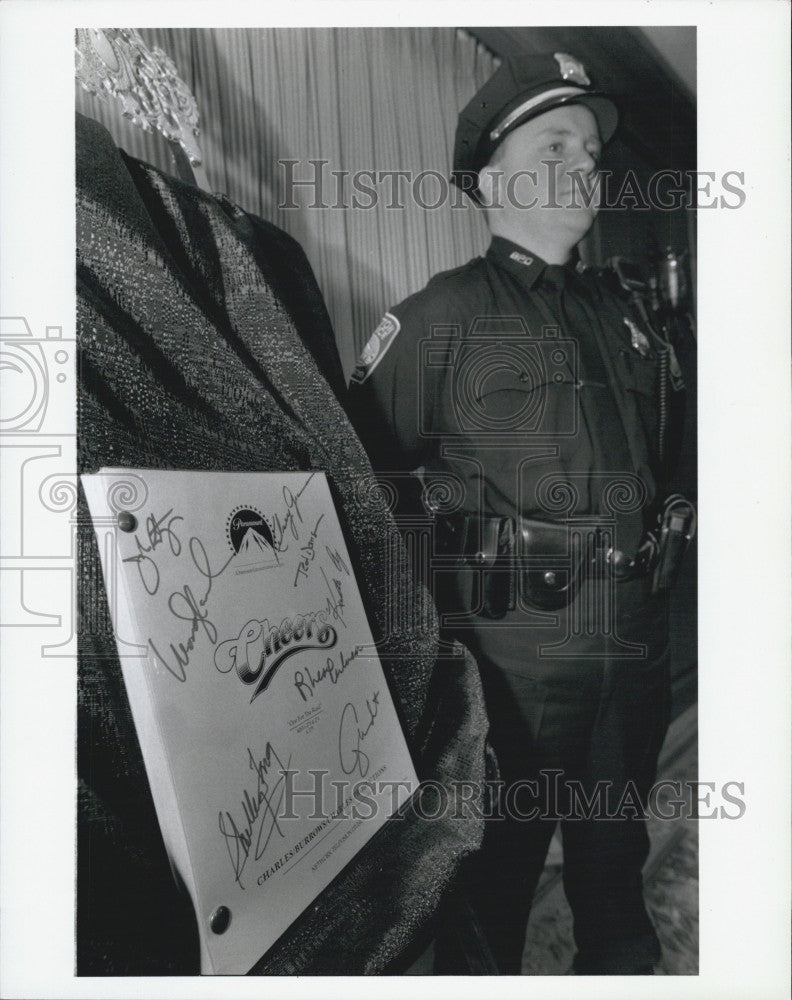 1997 Press Photo Patrolman Larry Sullivan recovered Cheers script - Historic Images