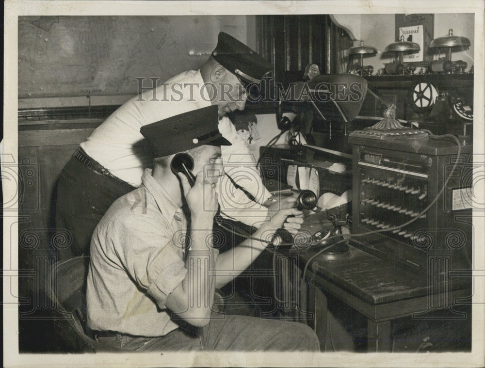 1949 Press Photo Roy Baker &amp; Capt. Peter Lyons Flooded With Emergency Calls - Historic Images