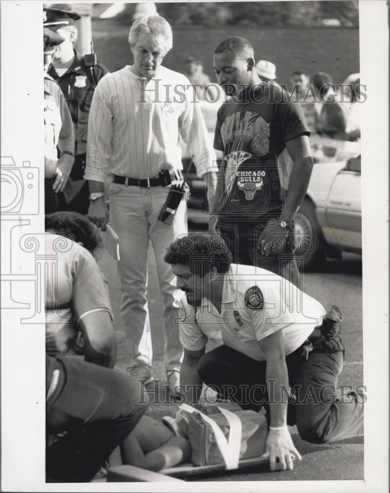 1992 Press Photo Boston paramedics worked on Marie Evans after hit &amp; run - Historic Images