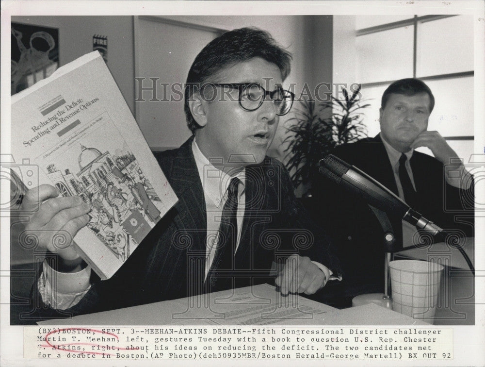 1994 Press Photo Martin T.Meehan gestures with a book with a book. - Historic Images