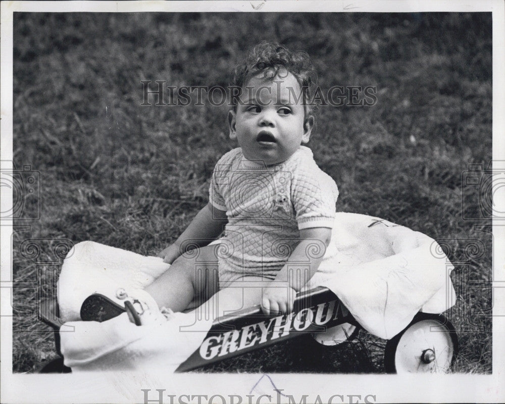 1977 Press Photo Baby Seth in a toy wagon - Historic Images