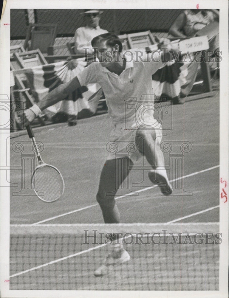 1964 Press Photo Roy Emerson flies in all directions after returning shot - Historic Images