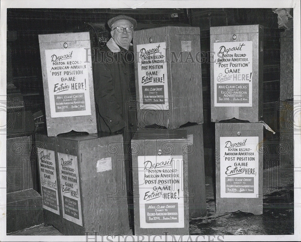 1961 Press Photo Hearse Driver Peter Cohen with Game Entry Deposti Boxes - Historic Images