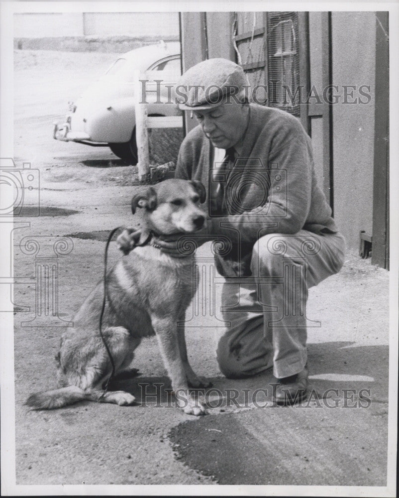 1959 Press Photo Quincy Cop James A. D. Mackay, dog that he rescued - Historic Images