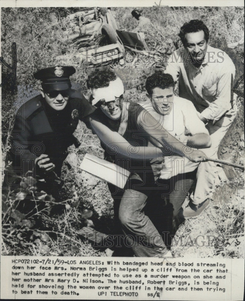 1959 Press Photo Mrs Norma Briggs rescued from car wreck in Los Angeles  Calif - Historic Images