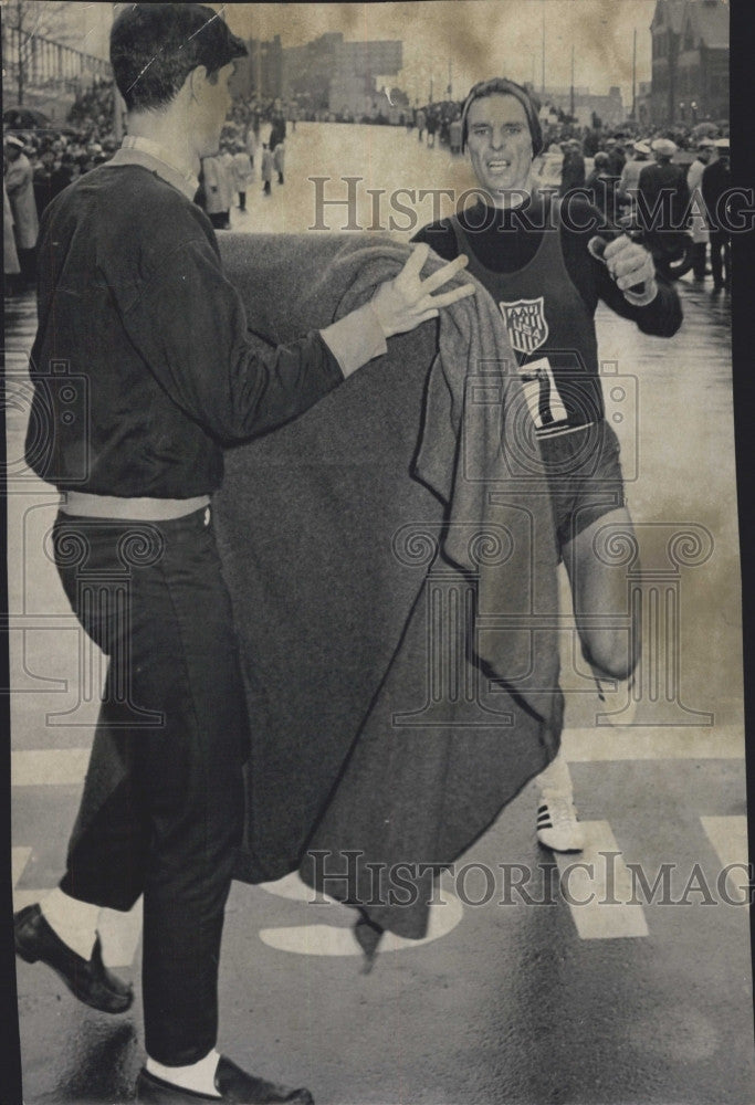 1967 Press Photo 2nd In B.A.A. Marathon Tom Laris Welcomed at Finish - Historic Images