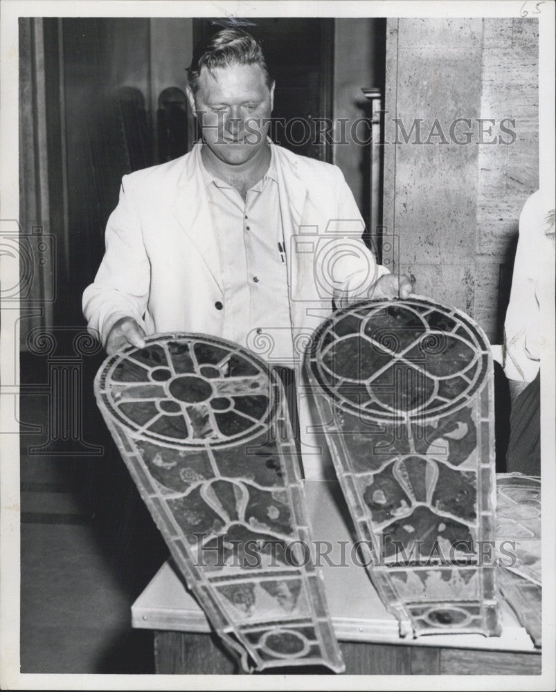 1961 Press Photo Det.Fred Nolan holds a glass church window stolen. - Historic Images