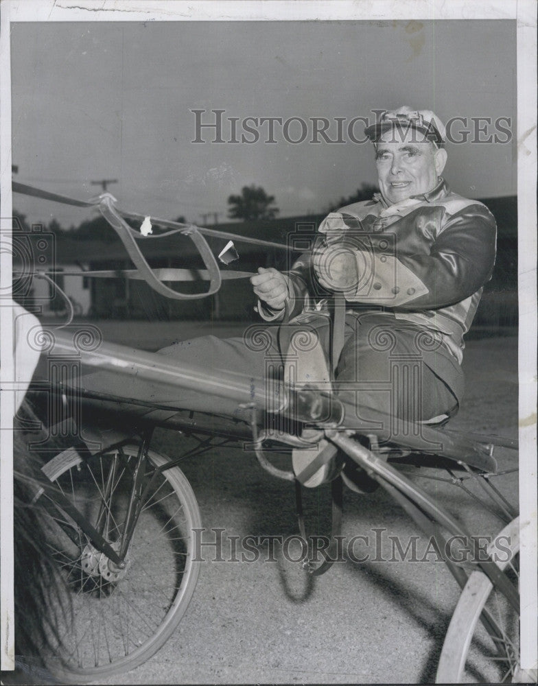 1956 Press Photo Cong Joseph W Martin Jr drives a harness race cart - Historic Images