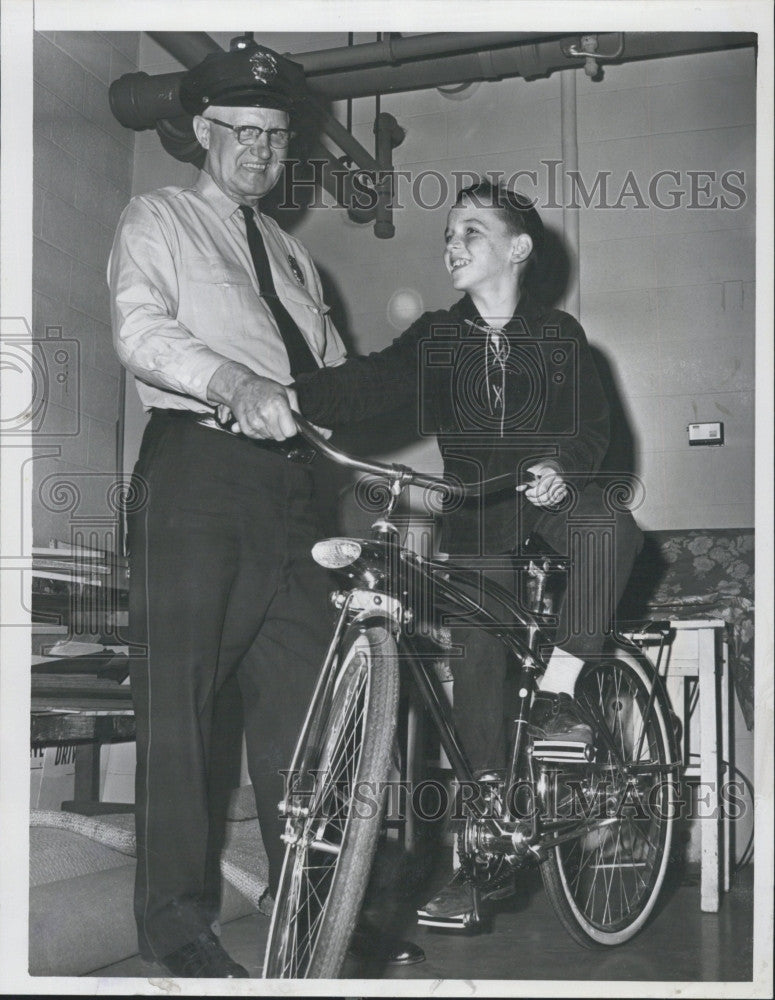 1966 Press Photo Policeman Myron Moody Gives Bicycle To Jimmy Campbell, Child - Historic Images