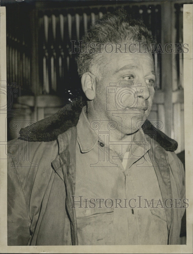 1956 Press Photo Henry Bromberg held up at his shop Albany Auto Parts - Historic Images