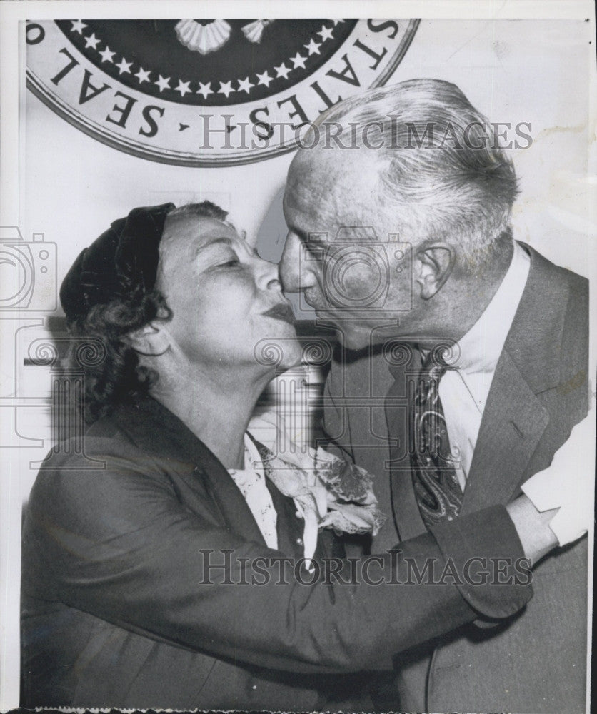 1958 Press Photo Wilton B Persons receives congratulatory kiss from wife - Historic Images