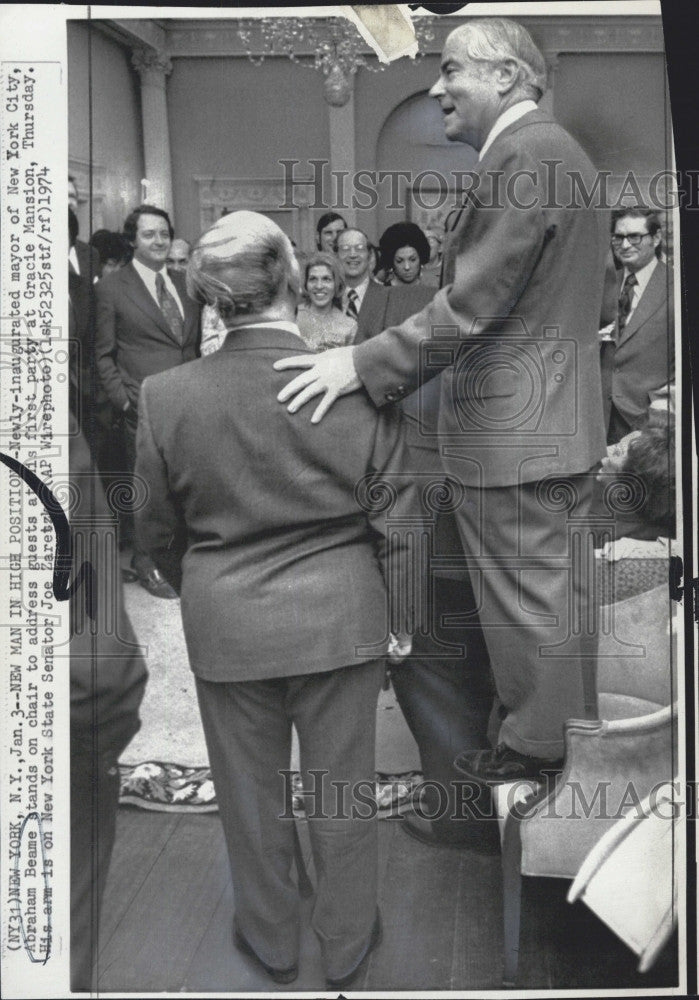 1974 Press Photo Mayor of New York Abraham Beame Standing in Chair - Historic Images