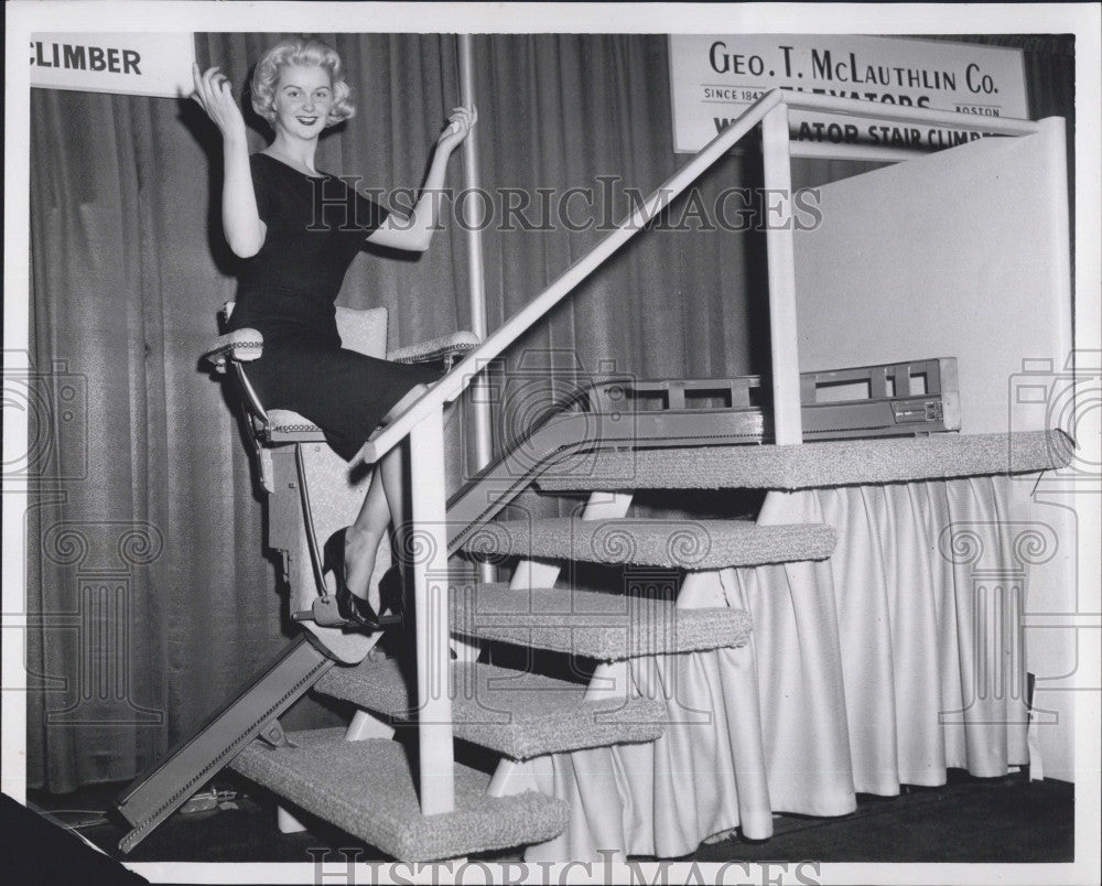 1960 Press Photo Patricia Larracbee models a Electric Wecolator stair Climber. - Historic Images