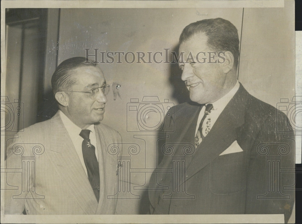 1952 Press Photo Guido Rugo chatting with his attorney John Hurley in Suffolk MA - Historic Images