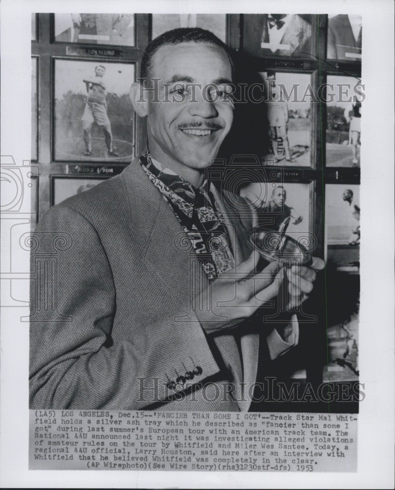 1953 Press Photo Track star, Mal Whitfield and an ashtray - Historic Images