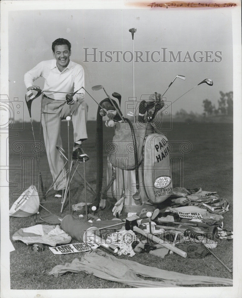 1964 Press Photo A golfer and all of his equipment displayed - Historic Images