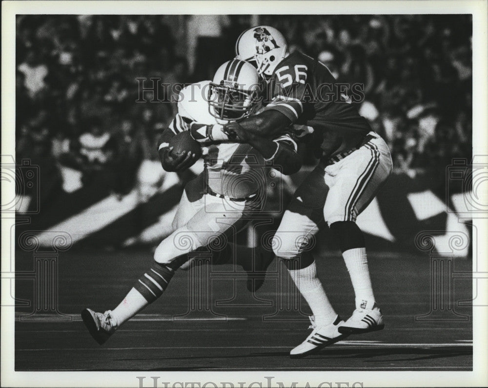 1983 Press Photo Andra Franklin,Andre Tippett in Miami vs N.E. football - Historic Images