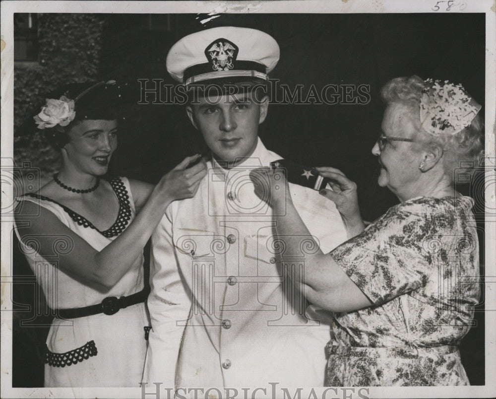 1956 Press Photo Navy Ensign Paul Cormack receives his shoulder board. - Historic Images