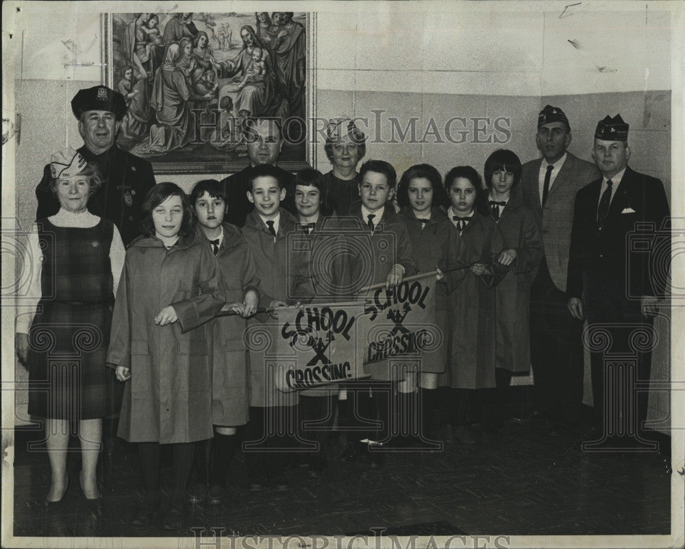 1965 Press Photo  Raincoat wears by members of St.Anthony School safety patrol. - Historic Images