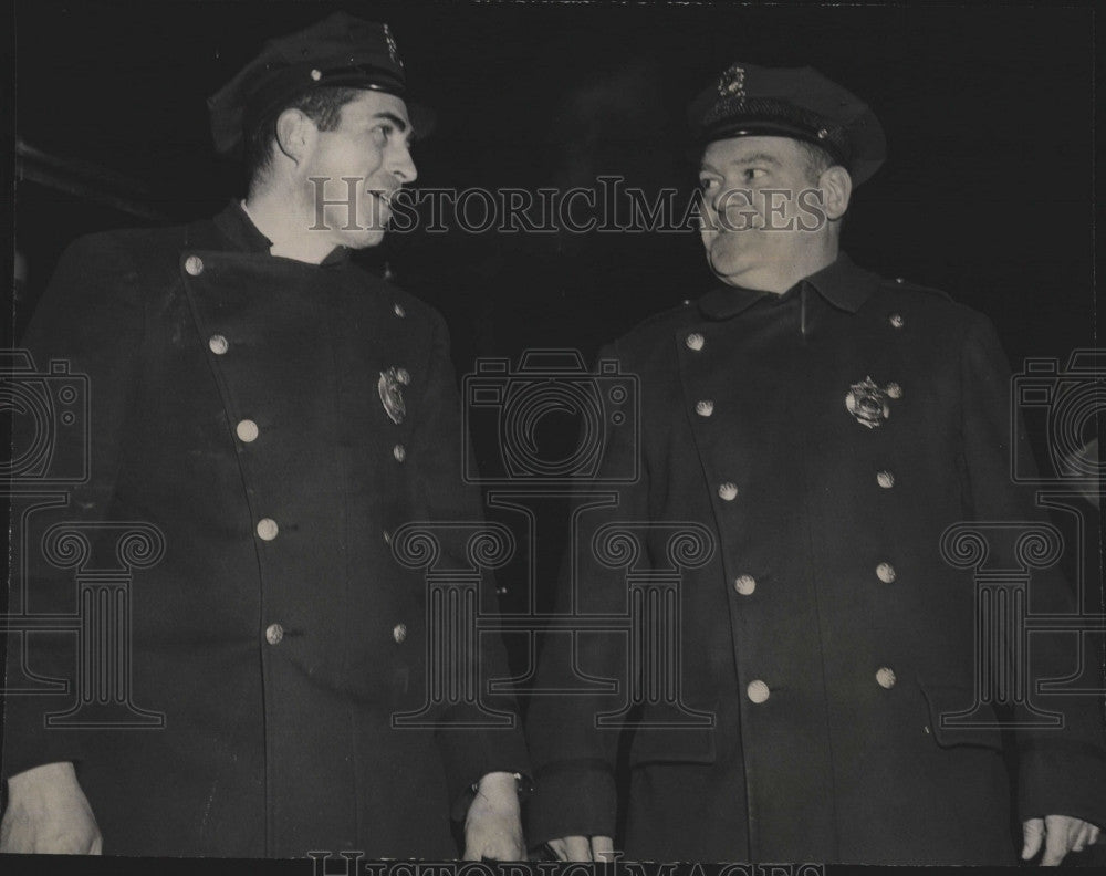 1963 Press Photo Police Officers Robert Cormier and Joseph Flynn rescued - Historic Images