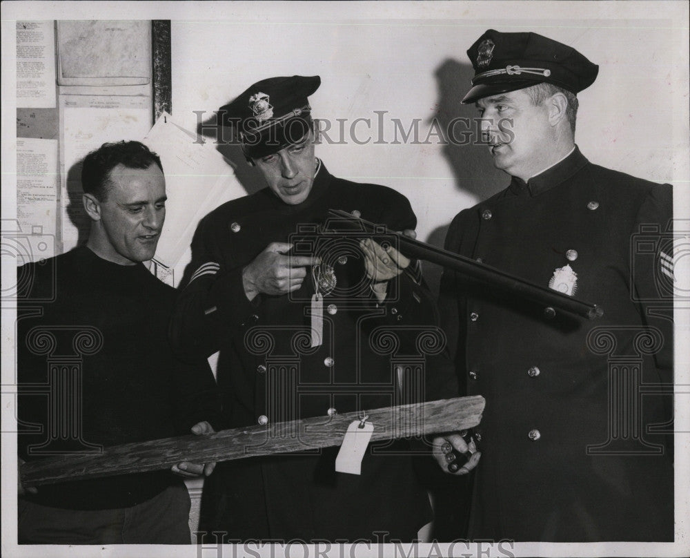 1957 Press Photo Newton Police Examine Weapoms Used In Assaults - Historic Images