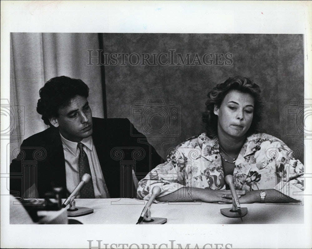 Press Photo Man and Woman giving a press conference - Historic Images