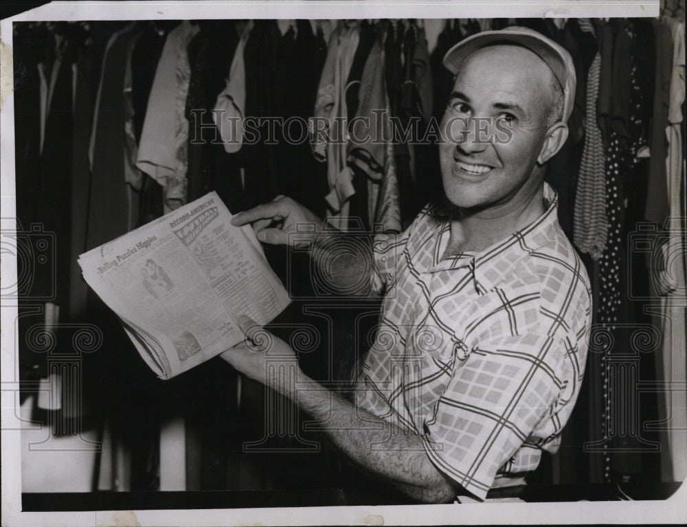 1954 Press Photo Joseph Tantillo points to newspaper on Football Contest - Historic Images