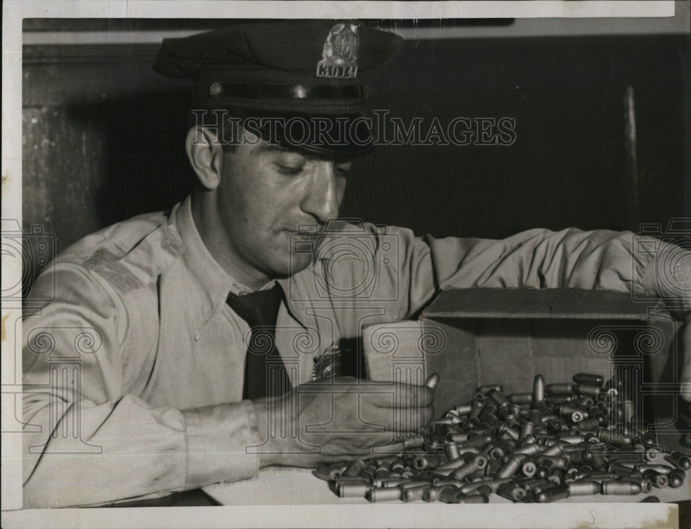 1952 Press Photo John Tanous Boston Police Looking at Bullets Found By Ships - Historic Images