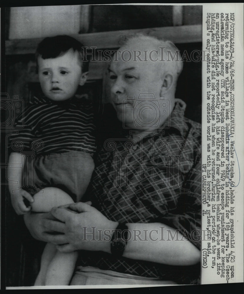 1968 Vaclav Stupka holds his grandchild after returning to his-Historic Images