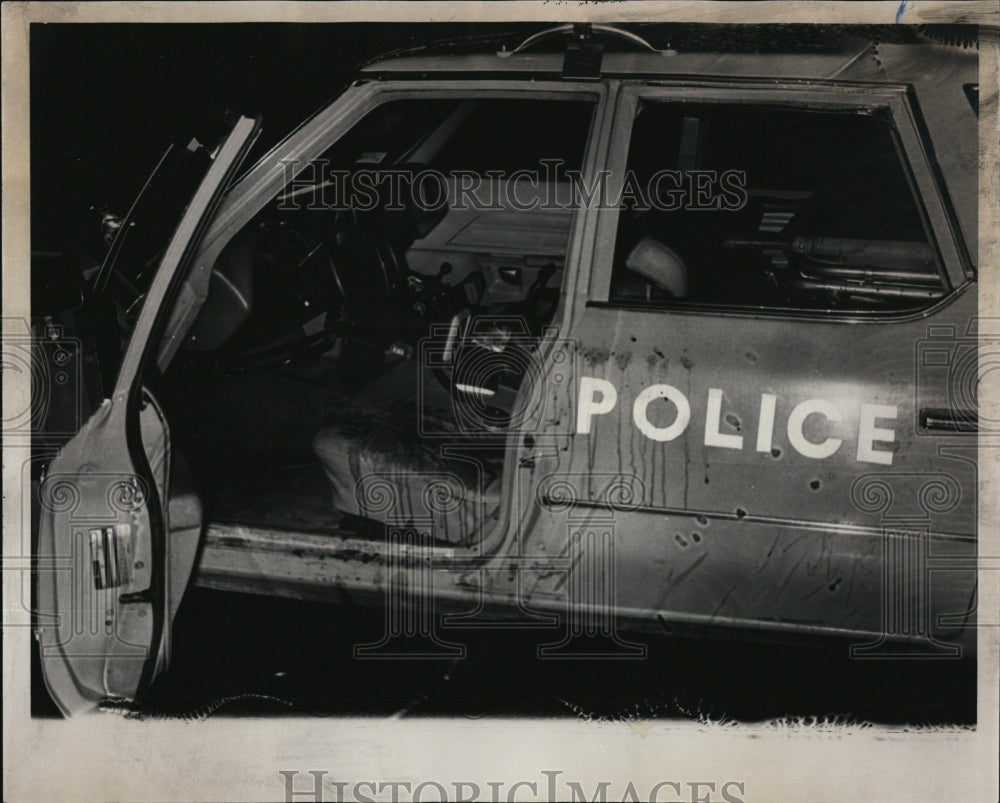Blood spattered police car after robbery & shooting in Braintree-Historic Images