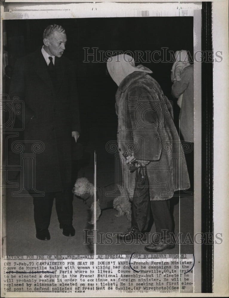 1957 Press Photo French Foreign Minister Couve De Murville woman Paris - Historic Images