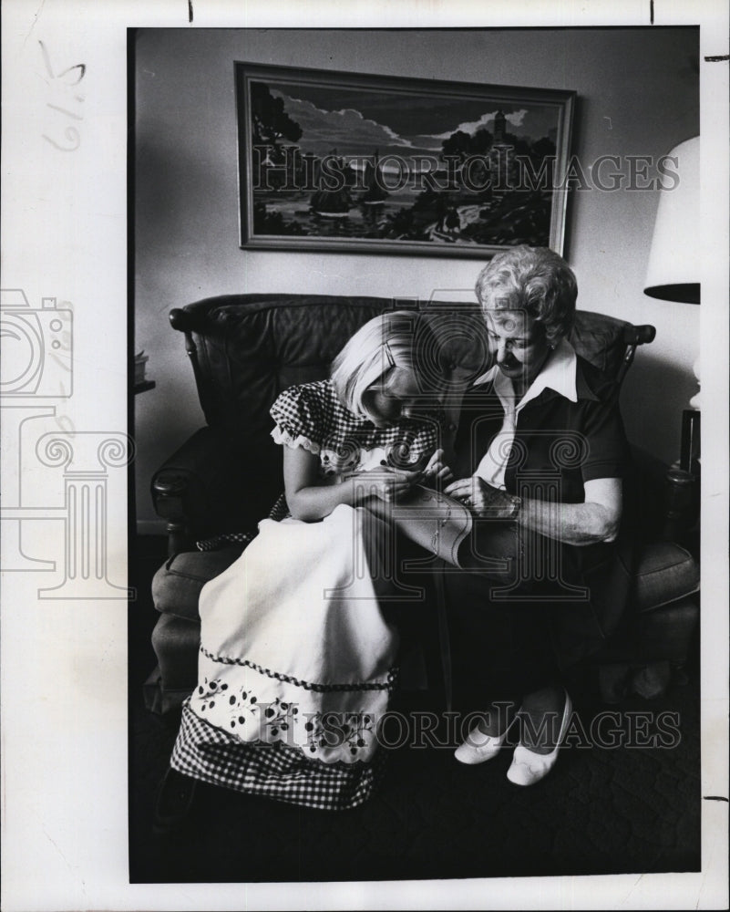 1977 Mrs Nancy Miller teaches Elizabeth Appunn needlework - Historic Images
