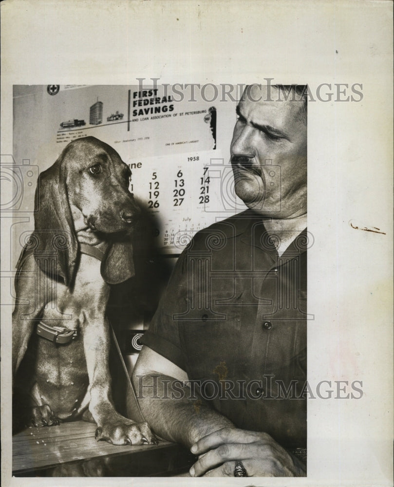 1958 Press Photo Joe Wellman and Newly Acquired Bloodhound - RSM06347 - Historic Images