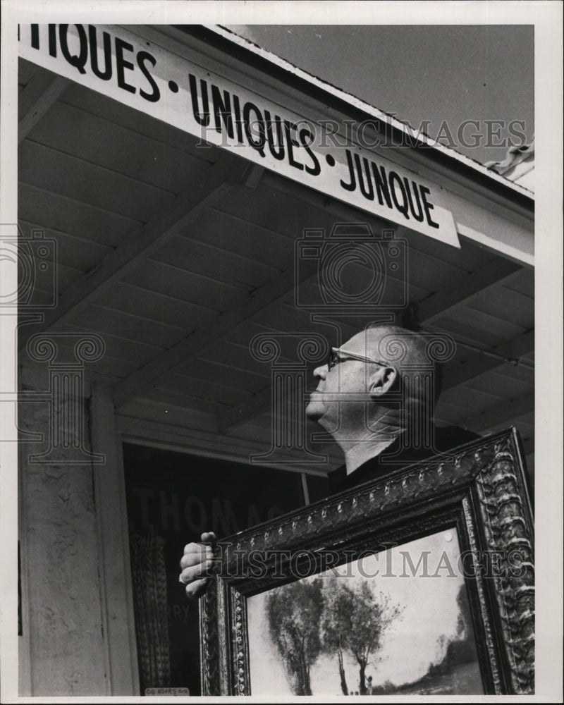 1964 Press Photo Harry E. Thomas holding French Print - RSM07379 - Historic Images