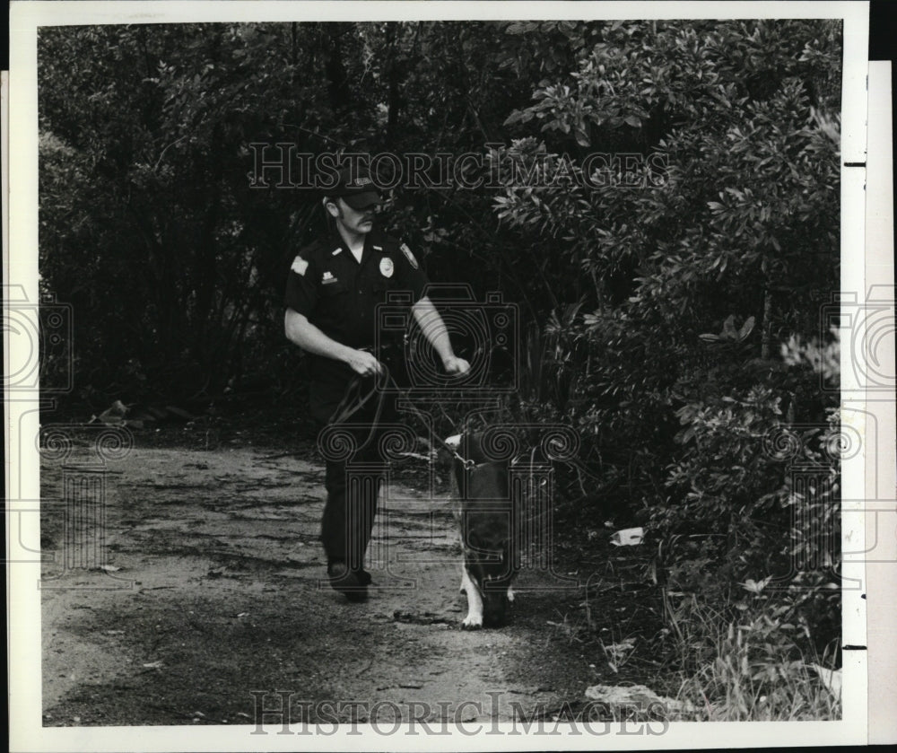 1972 Press Photo A Policeman patrolling with police Dog - RSM08671 - Historic Images