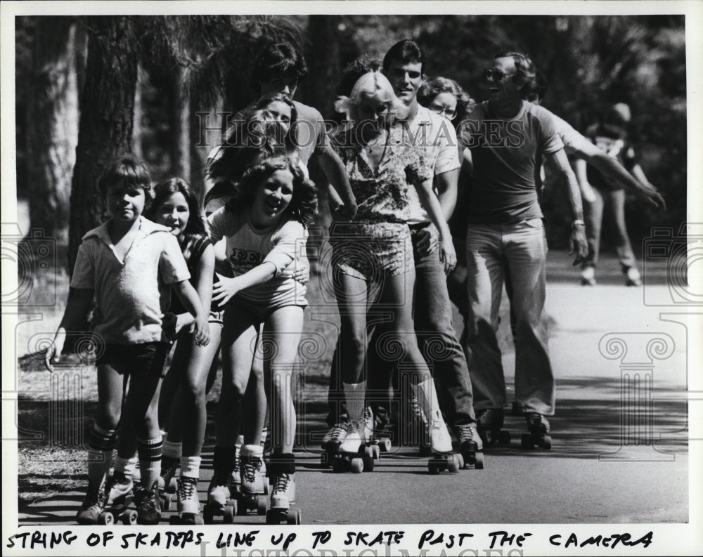 1981 String of Skaters on Television Commercial - Historic Images