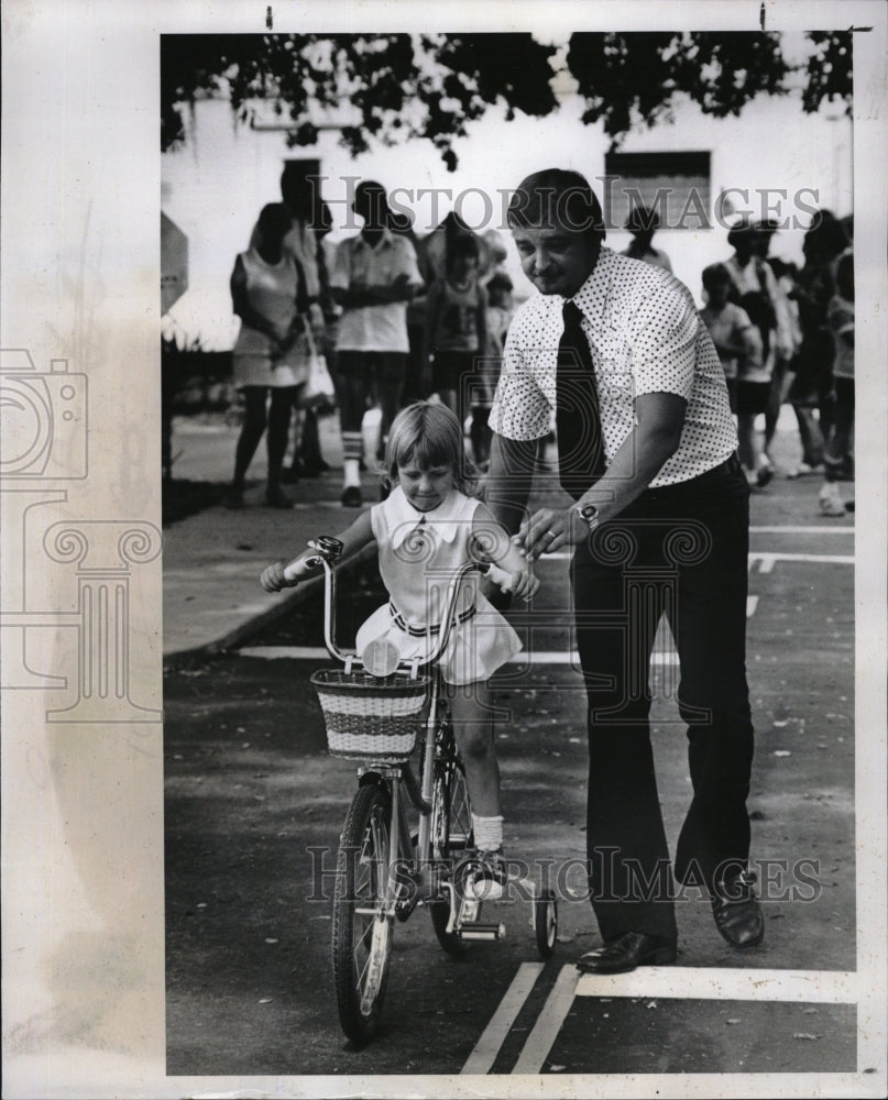 1972 Press Photo Christi Laird riding bicycle down street - RSM09761 - Historic Images