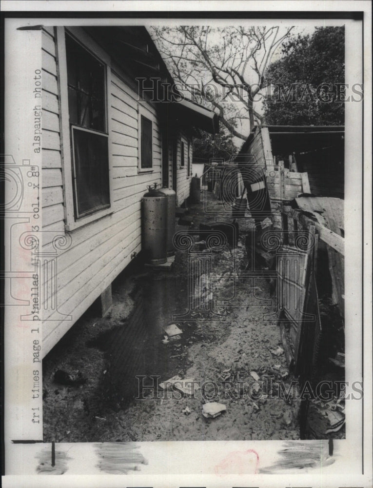 1973 Tarpon Springs Home with Sewage Running Out - Historic Images