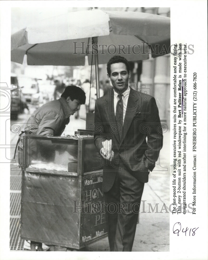 1992 Press Photo Navy 2-button suit with red windowpane by Bert Pulitzer Relax - Historic Images